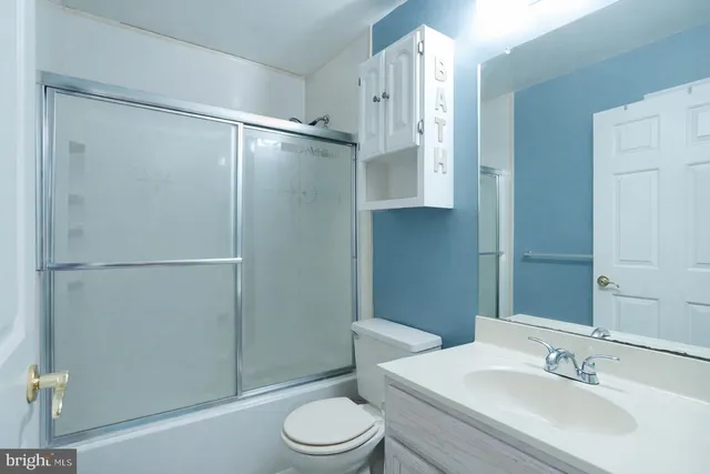 a room with window and furniture