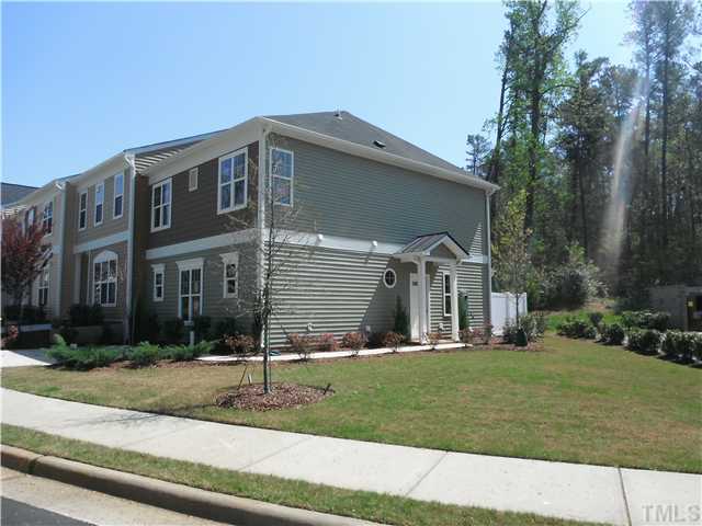 209 Deacon Ridge Street Wake Forest, NC 27587 - Photo 3 of 6 End Townhome has generous side yard
