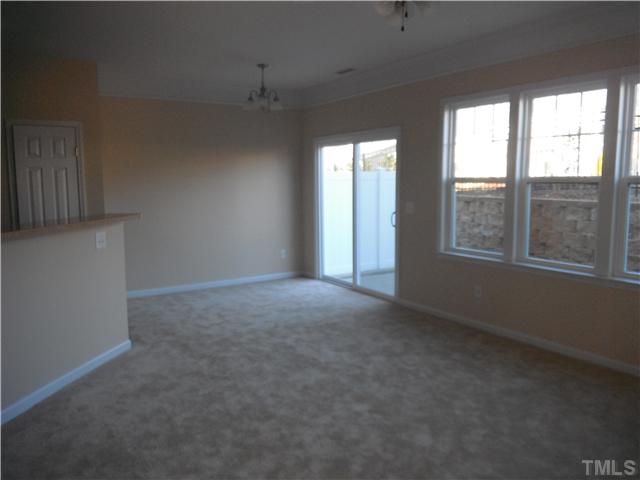 209 Deacon Ridge Street Wake Forest, NC 27587 - Photo 6 of 6 represents a finshed living/dining area of the same model.