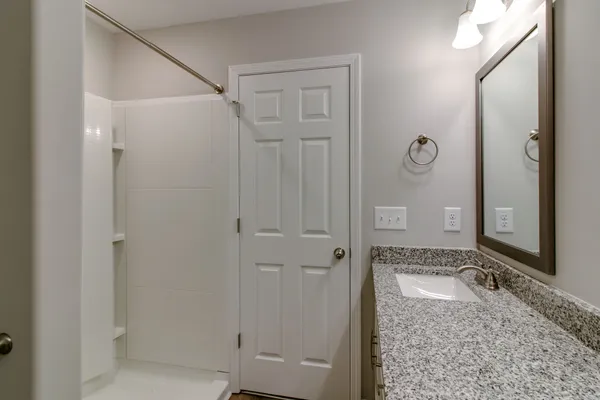 a view of a livingroom from a hallway