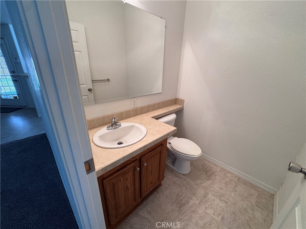 26362 Community Boulevard Barstow, CA 92311 - Photo 11 of 34 Half bath near front door