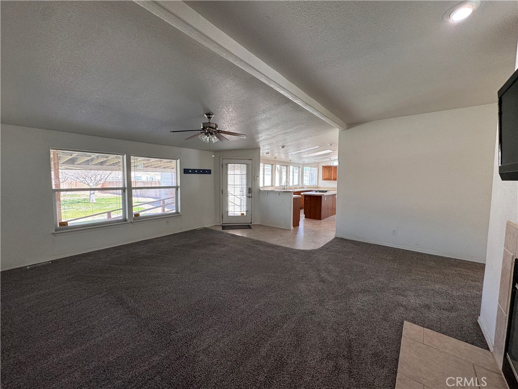 26362 Community Boulevard Barstow, CA 92311 - Photo 12 of 34 Family room looking toward kitchen