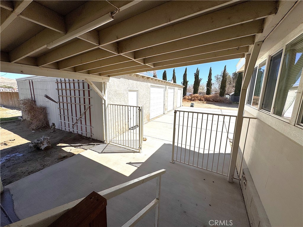 26362 Community Boulevard Barstow, CA 92311 - Photo 29 of 34 Looking out of the back door toward the gargae