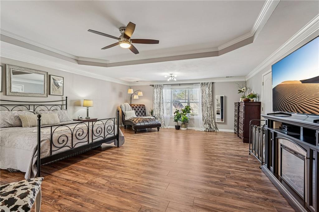 909 Elderberry Lane Villa Rica, GA 30180 - Photo 14 of 34 a living room with furniture and a wooden floor