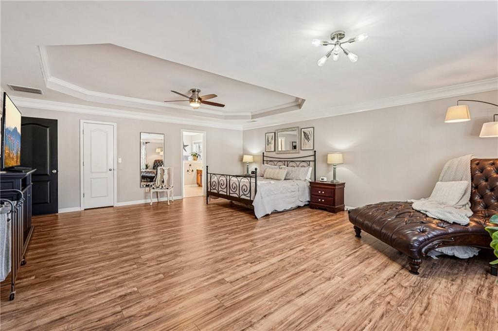 909 Elderberry Lane Villa Rica, GA 30180 - Photo 15 of 34 a living room with furniture and a wooden floor