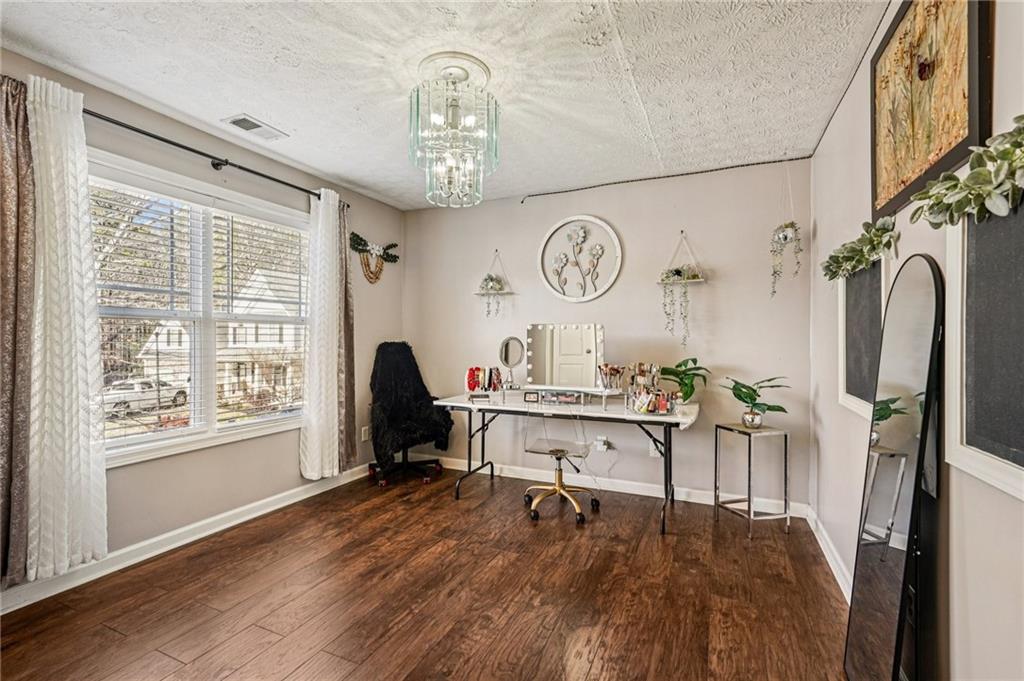 909 Elderberry Lane Villa Rica, GA 30180 - Photo 23 of 34 a view of a workspace with furniture and a window