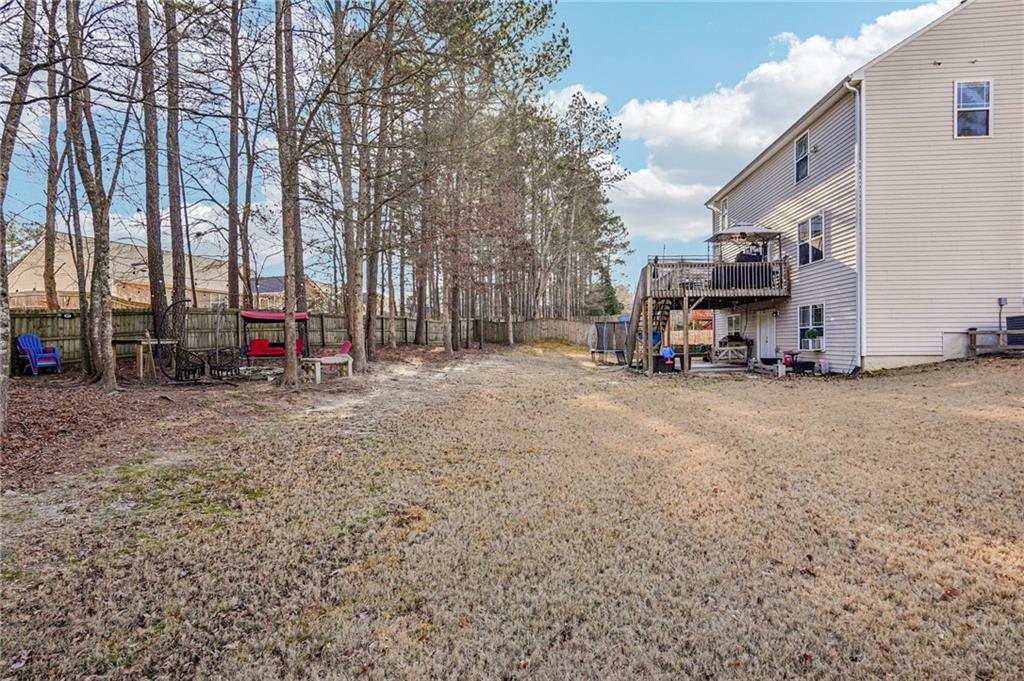 909 Elderberry Lane Villa Rica, GA 30180 - Photo 29 of 34 a view of road with card parked