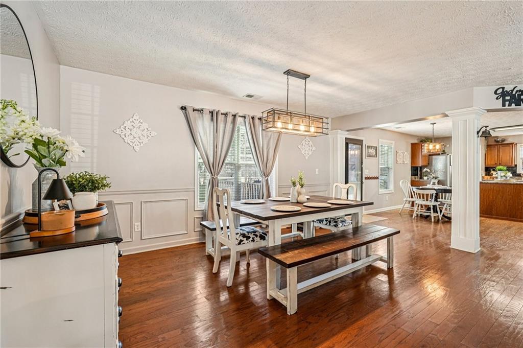 909 Elderberry Lane Villa Rica, GA 30180 - Photo 4 of 34 a living room with furniture and wooden floor