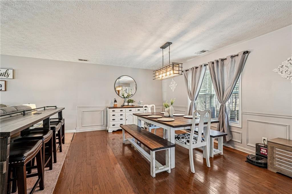 909 Elderberry Lane Villa Rica, GA 30180 - Photo 5 of 34 a view of a kitchen sink and stove