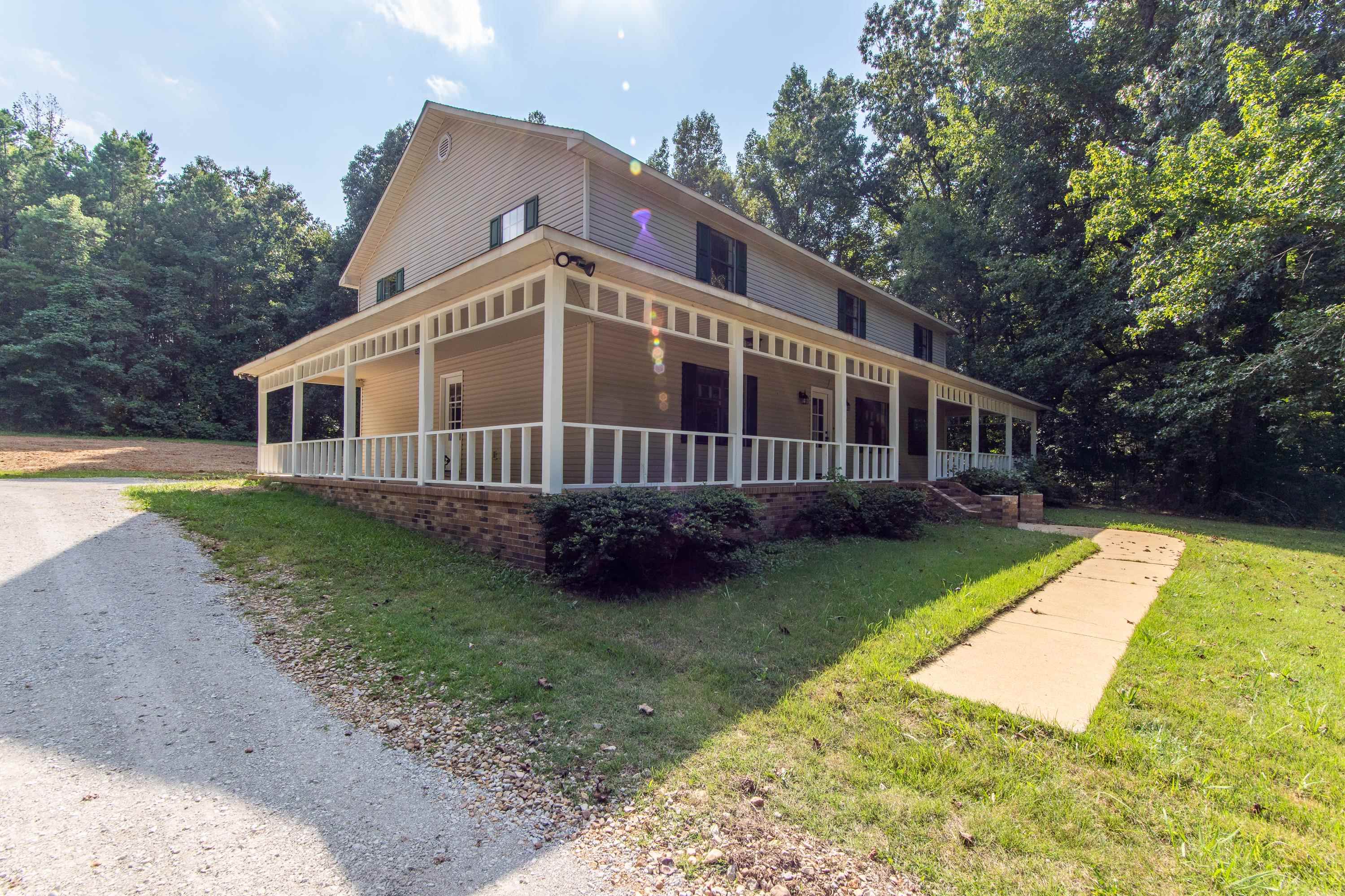 1020 County Road 600 Corinth, MS 38834 - Photo 3 of 37 a view of a house with a yard
