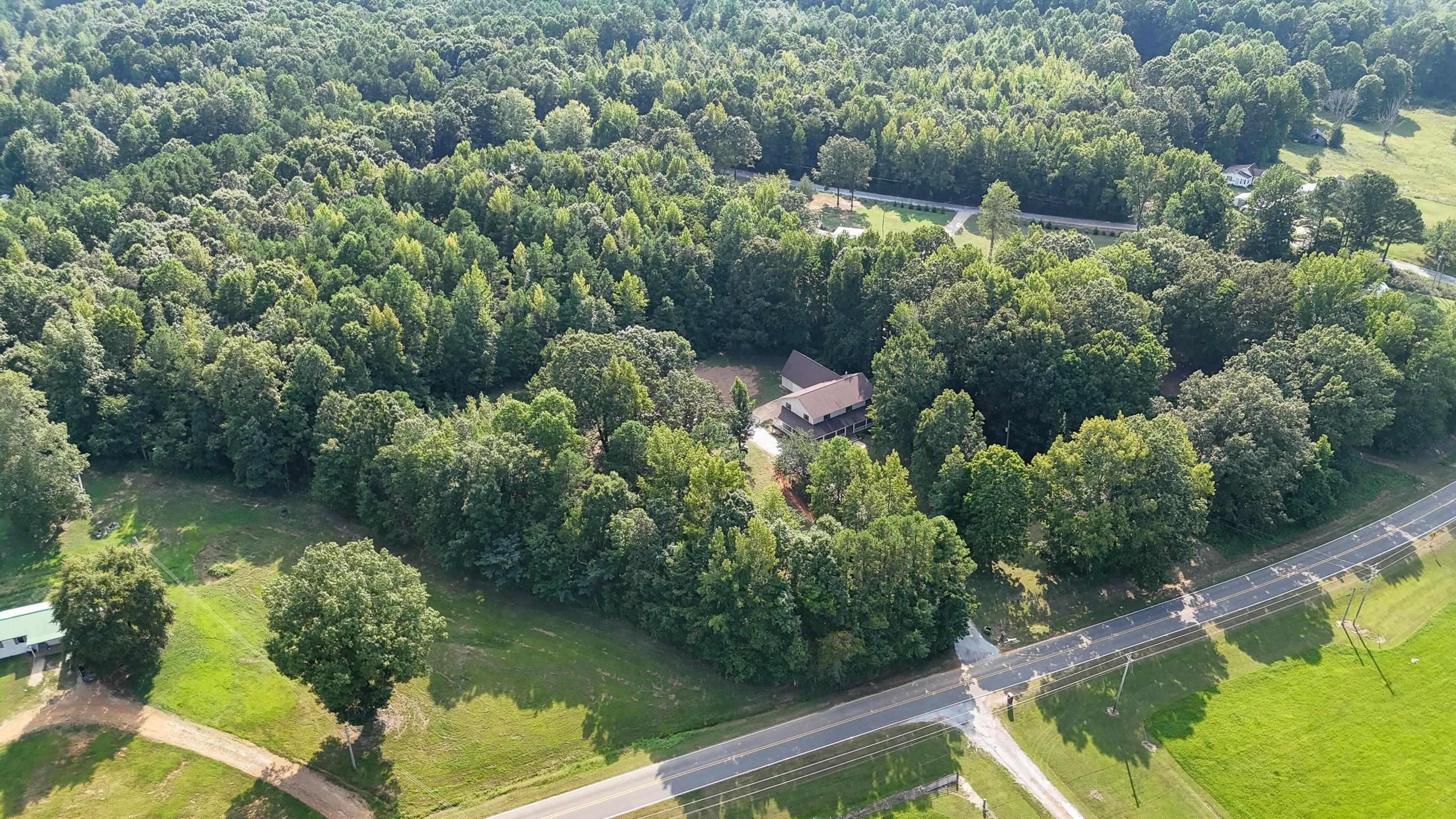 1020 County Road 600 Corinth, MS 38834 - Photo 33 of 37 a view of a lake with a house