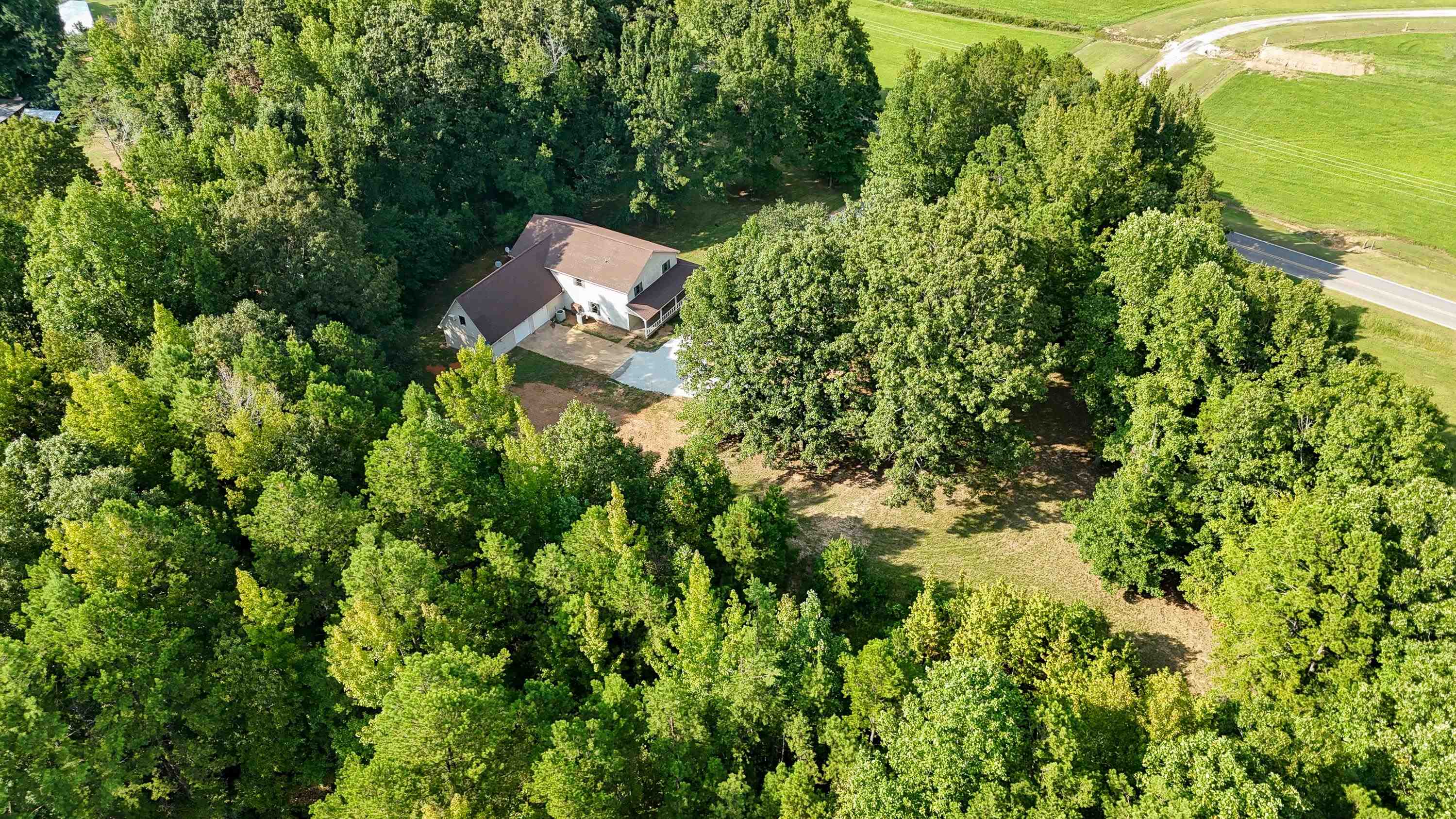 1020 County Road 600 Corinth, MS 38834 - Photo 35 of 37 an aerial view of a house with a yard