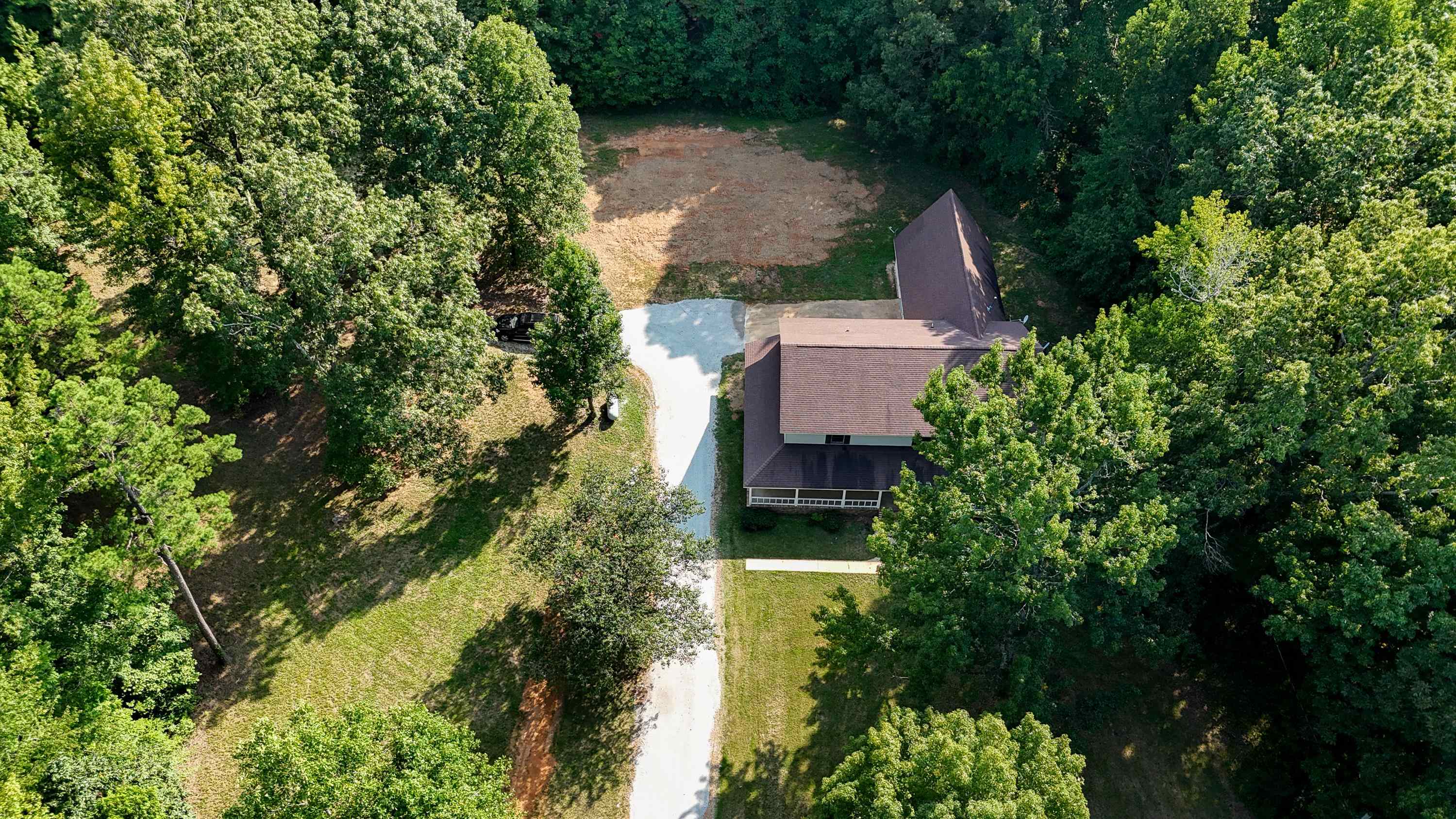 1020 County Road 600 Corinth, MS 38834 - Photo 36 of 37 an aerial view of a house with a yard