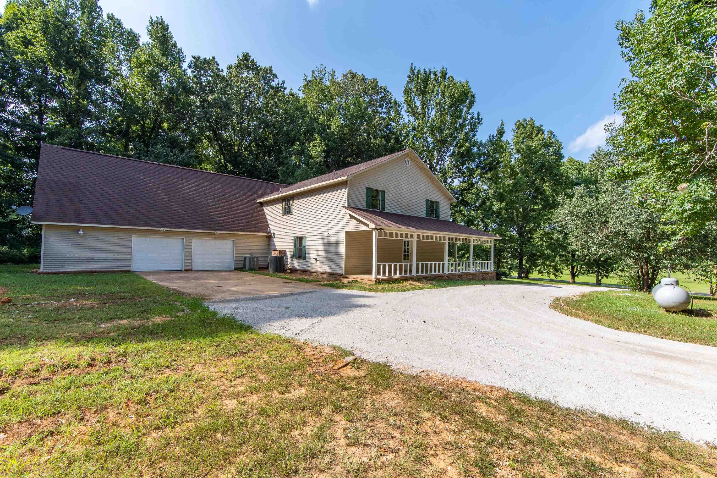 1020 County Road 600 Corinth, MS 38834 - Photo 8 of 37 a view of a house with a yard and large tree