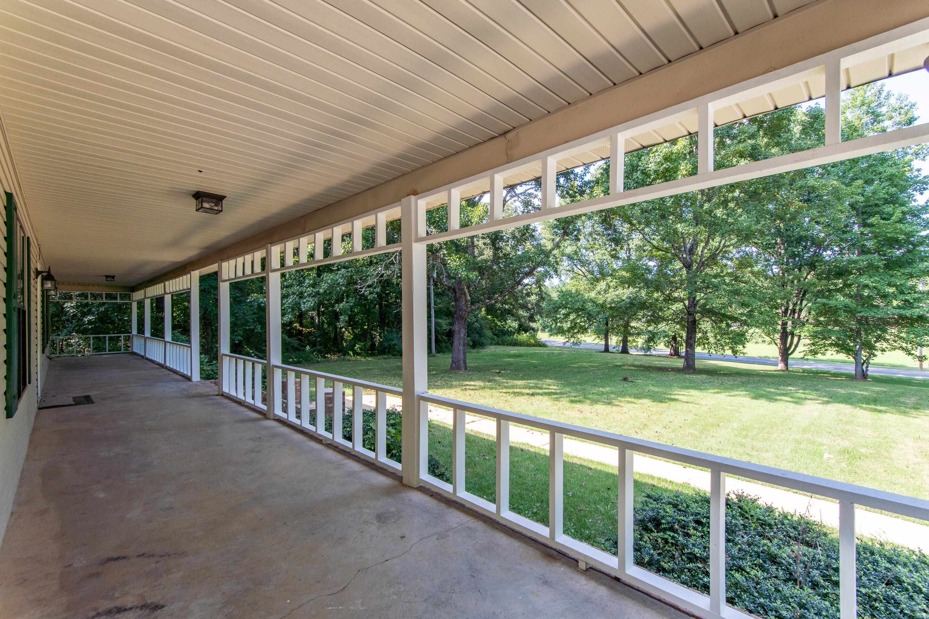 1020 County Road 600 Corinth, MS 38834 - Photo 9 of 37 a view of outdoor space with deck and garden