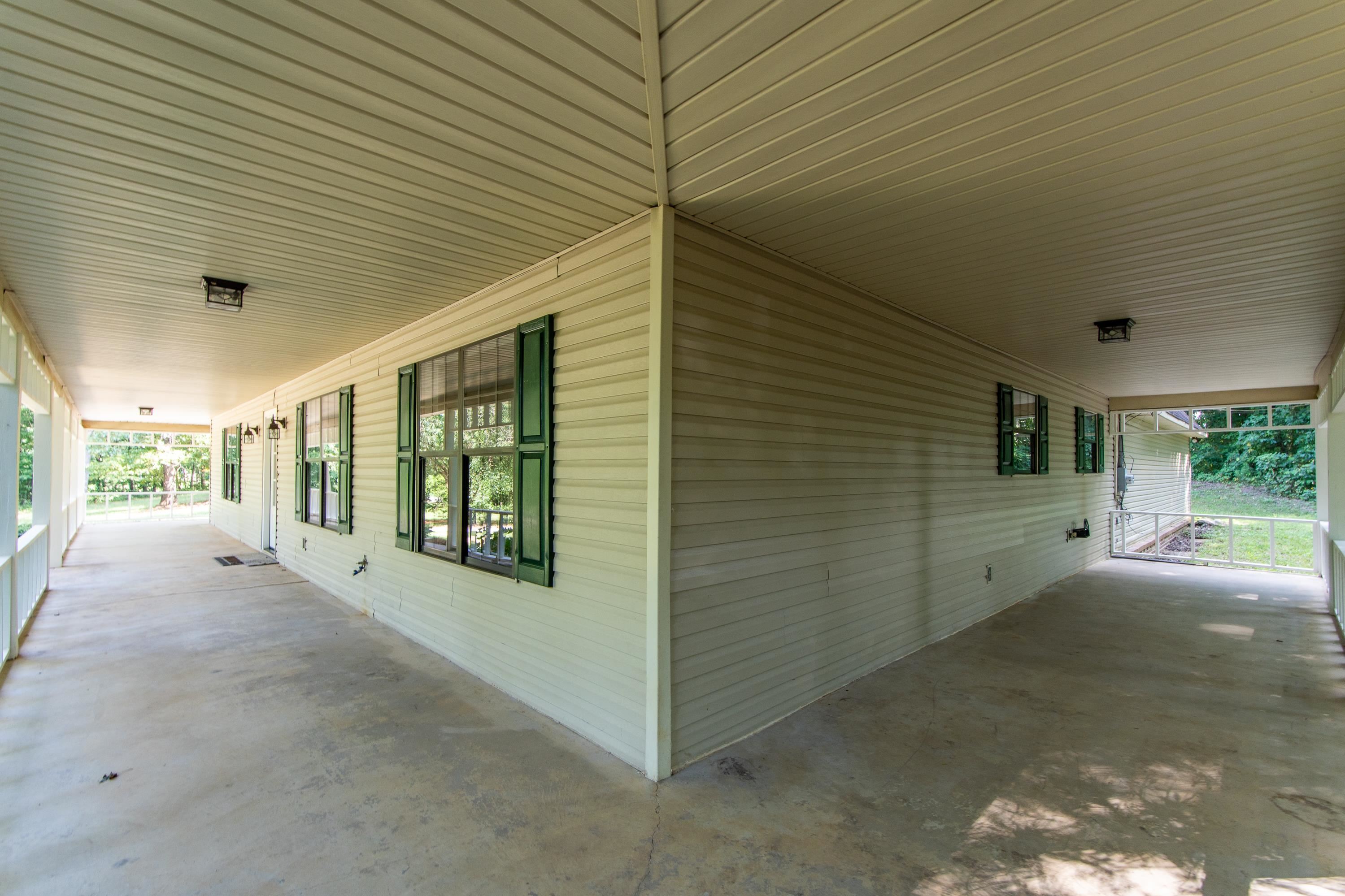 1020 County Road 600 Corinth, MS 38834 - Photo 10 of 37 a view of a porch with furniture