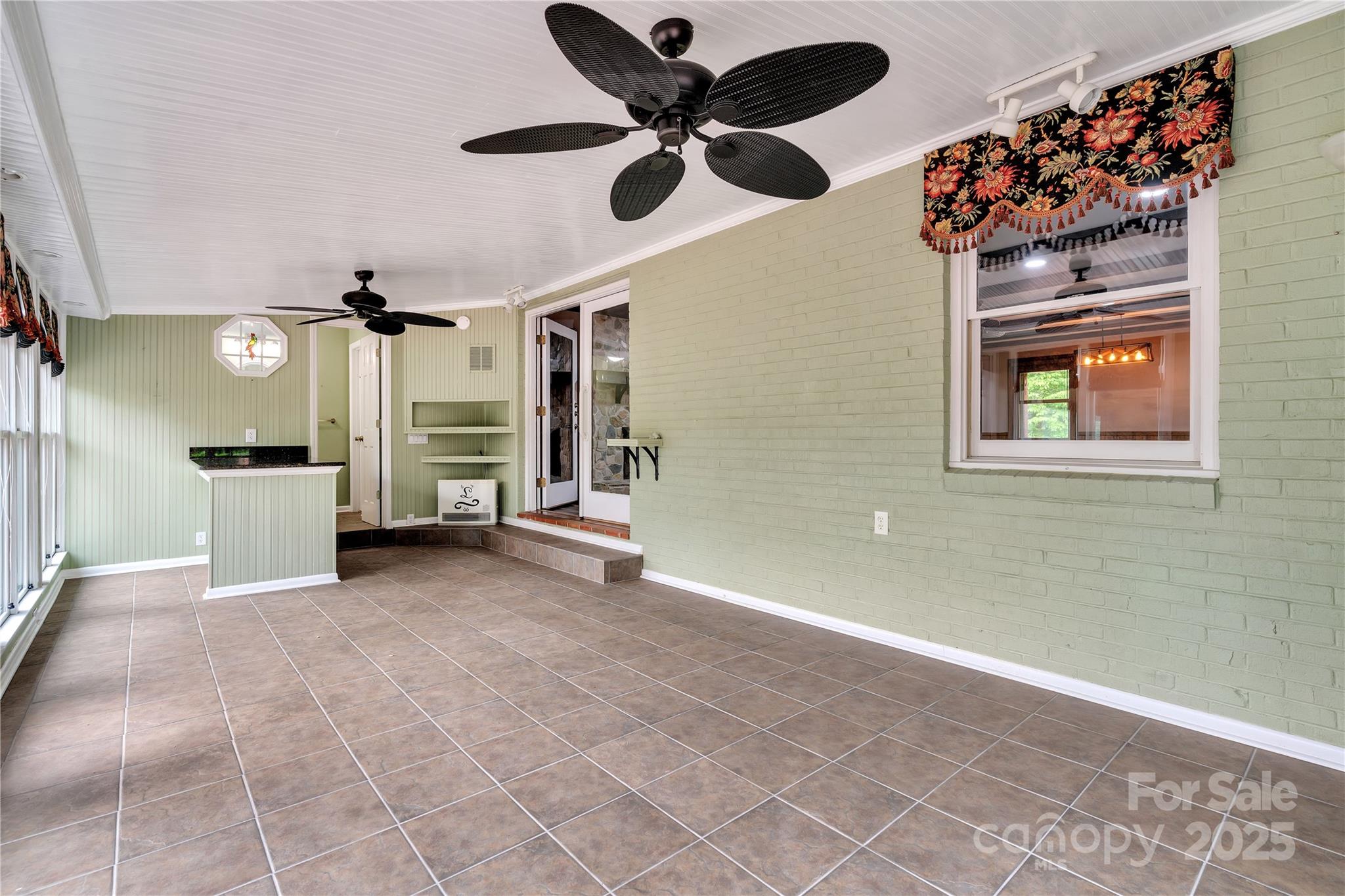 268 State Rd S-42-4322 Chesnee, SC 29323 - Photo 11 of 44 a view of an empty room with a window