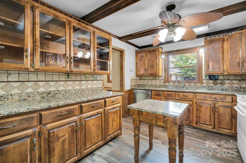 268 State Rd S-42-4322 Chesnee, SC 29323 - Photo 14 of 44 a kitchen with stainless steel appliances granite countertop wooden cabinets a stove a sink and dishwasher