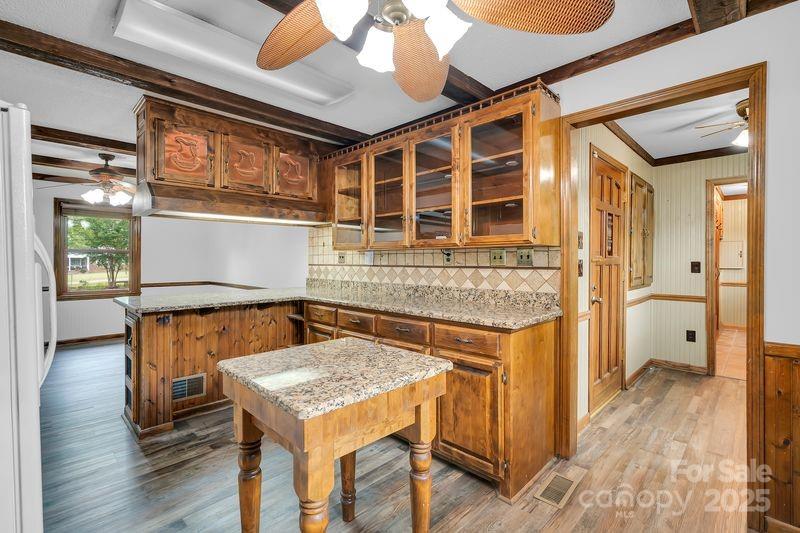 268 State Rd S-42-4322 Chesnee, SC 29323 - Photo 15 of 44 a view of a kitchen area with furniture and wooden floor