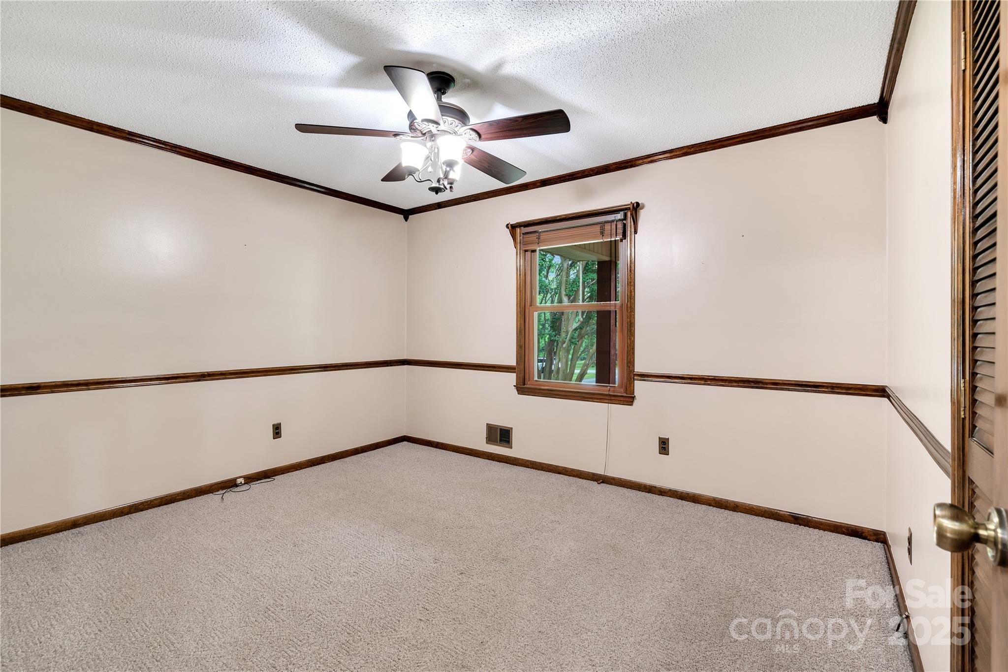268 State Rd S-42-4322 Chesnee, SC 29323 - Photo 31 of 44 a view of an empty room with a window