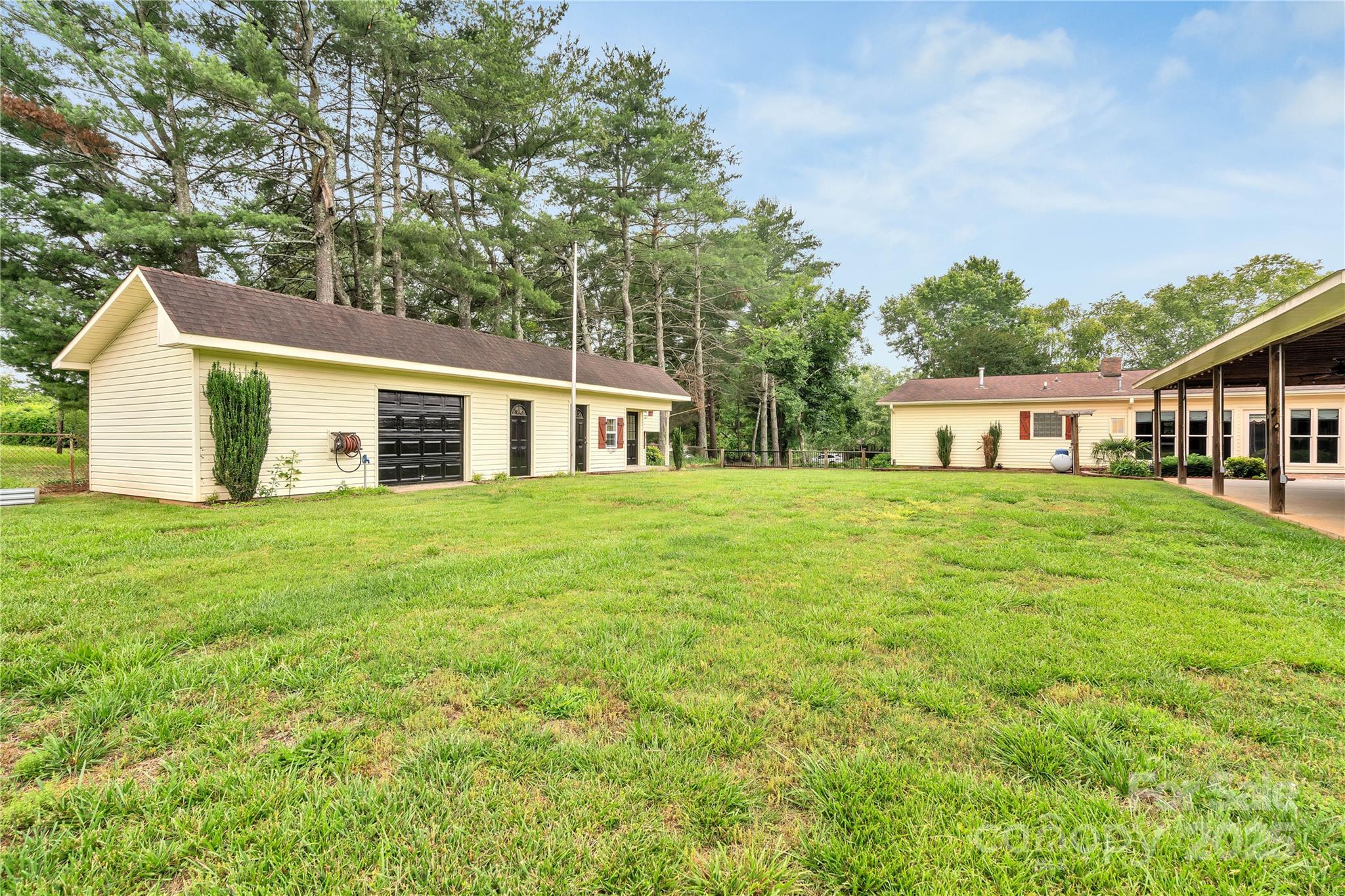 268 State Rd S-42-4322 Chesnee, SC 29323 - Photo 38 of 44 a house view with a garden space