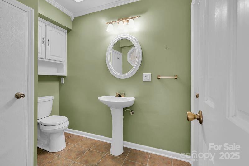 268 State Rd S-42-4322 Chesnee, SC 29323 - Photo 10 of 44 a bathroom with a toilet sink and mirror