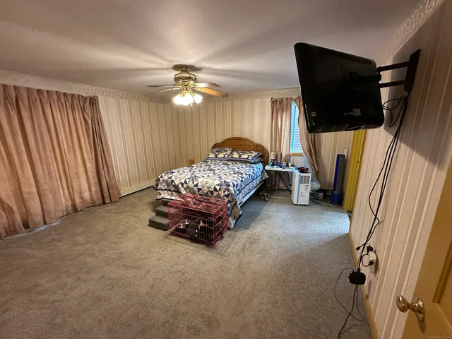 a view of a livingroom with a staircase