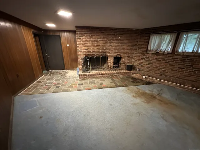 a view of livingroom with furniture and a flat screen tv