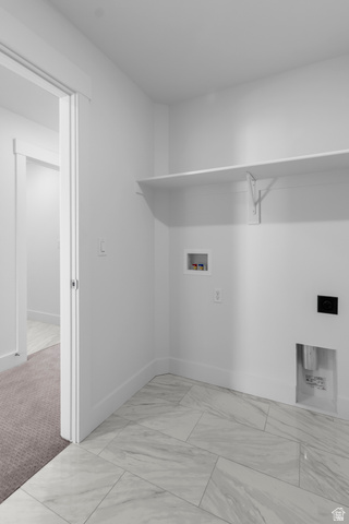 1237 West 500 South, Unit 230 Logan, UT 84321 - Photo 30 of 42 White tile flooring with a subtle gray marble-look pattern