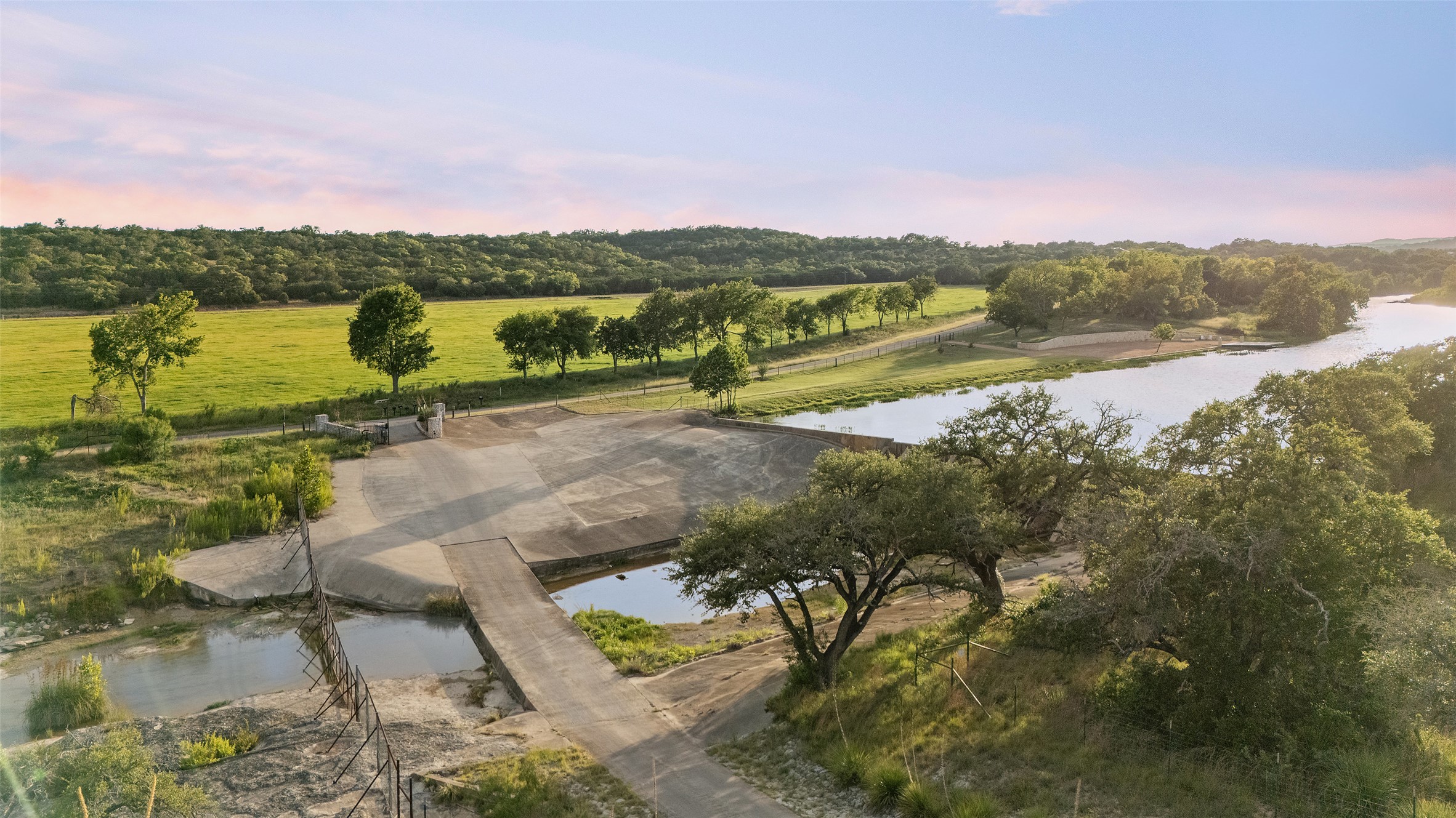 Lot 13 Byrd Ranch Road Johnson City, TX 78636 - Photo 13 of 19 Aerial view at dusk of a water view