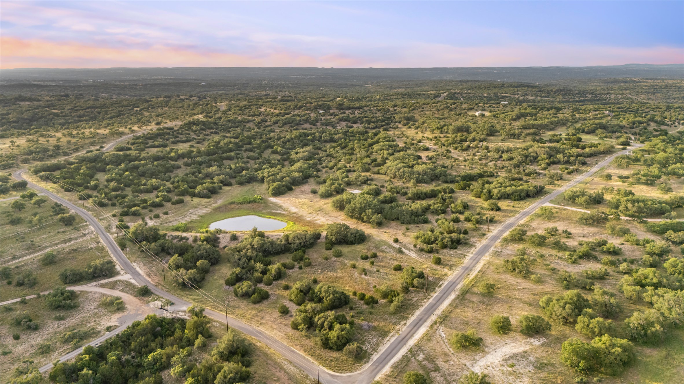 Lot 13 Byrd Ranch Road Johnson City, TX 78636 - Photo 17 of 19 Aerial view at dusk of a view of rural / pastoral area