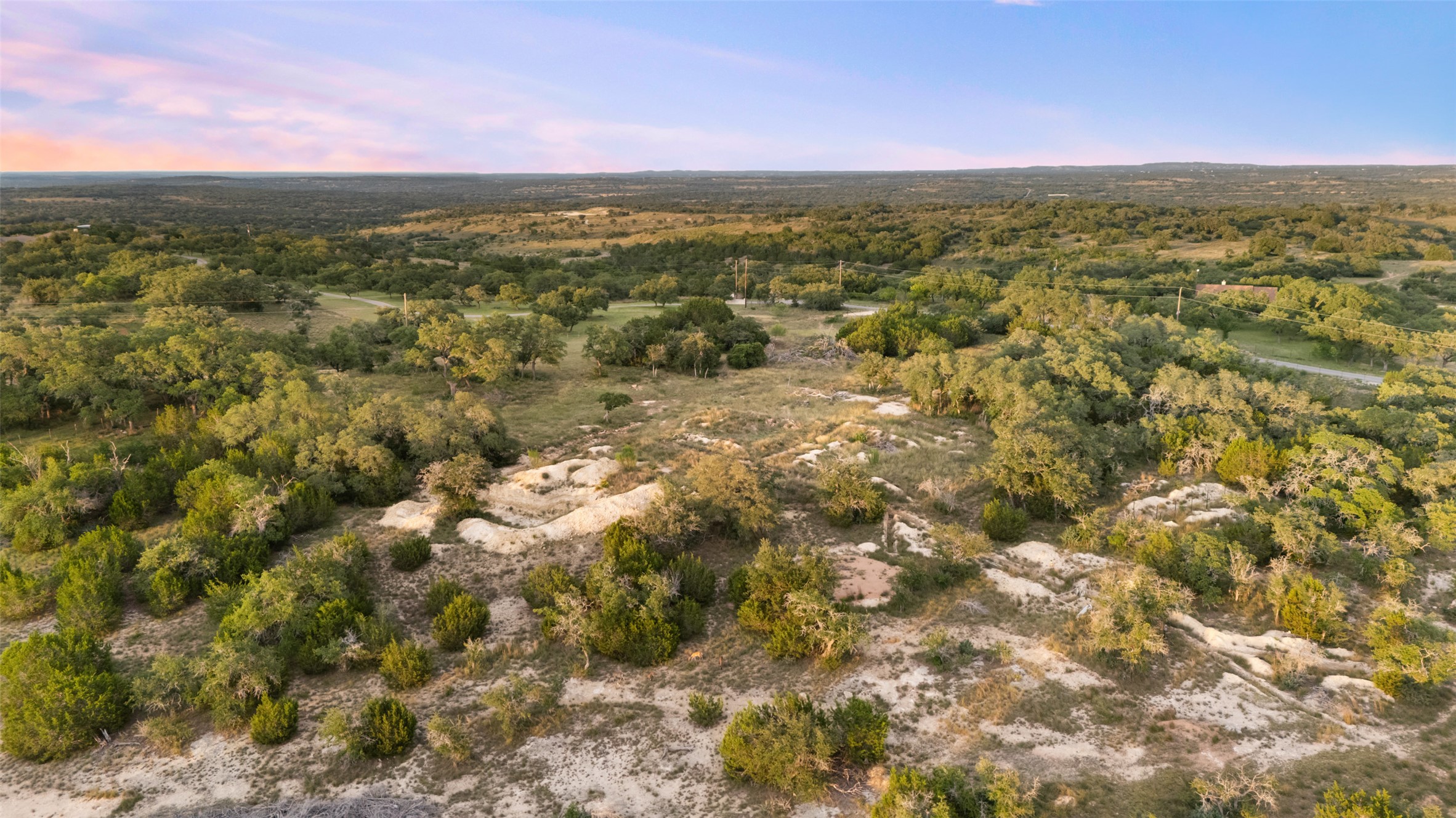 Lot 13 Byrd Ranch Road Johnson City, TX 78636 - Photo 3 of 19 Aerial overview of property's location featuring a forest