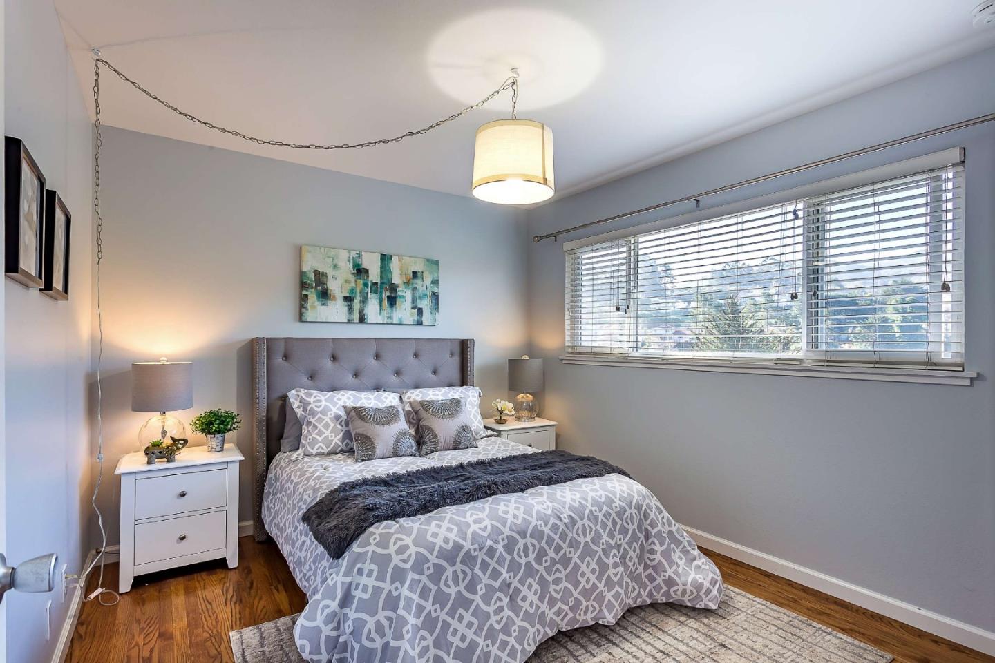 3 Yellowstone Way Pacifica, CA 94044 - Photo 14 of 21 a bedroom with a bed and a window