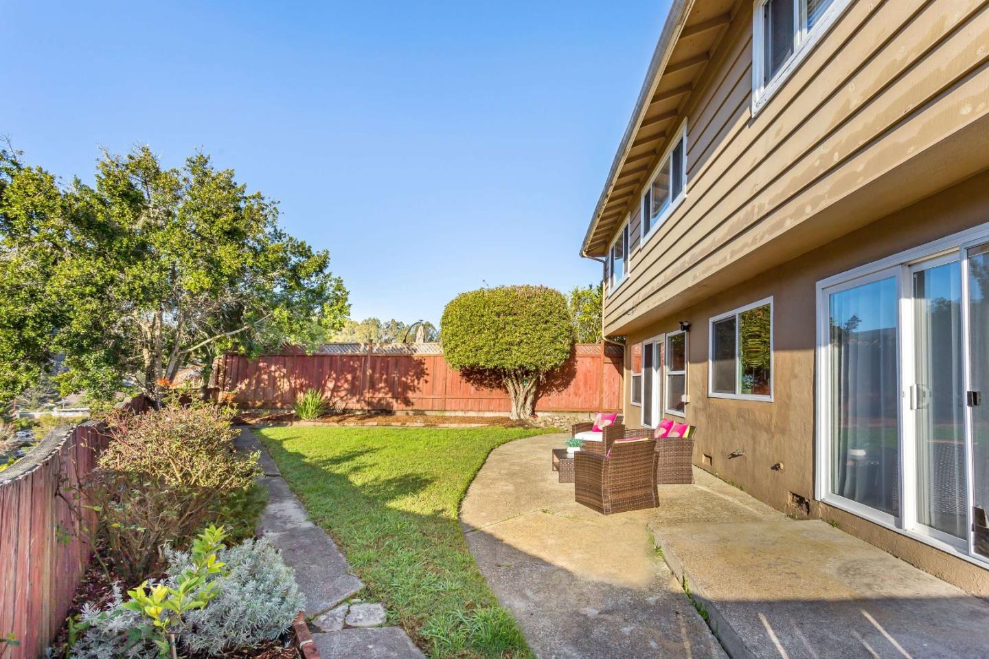 3 Yellowstone Way Pacifica, CA 94044 - Photo 20 of 21 a front view of a house with garden