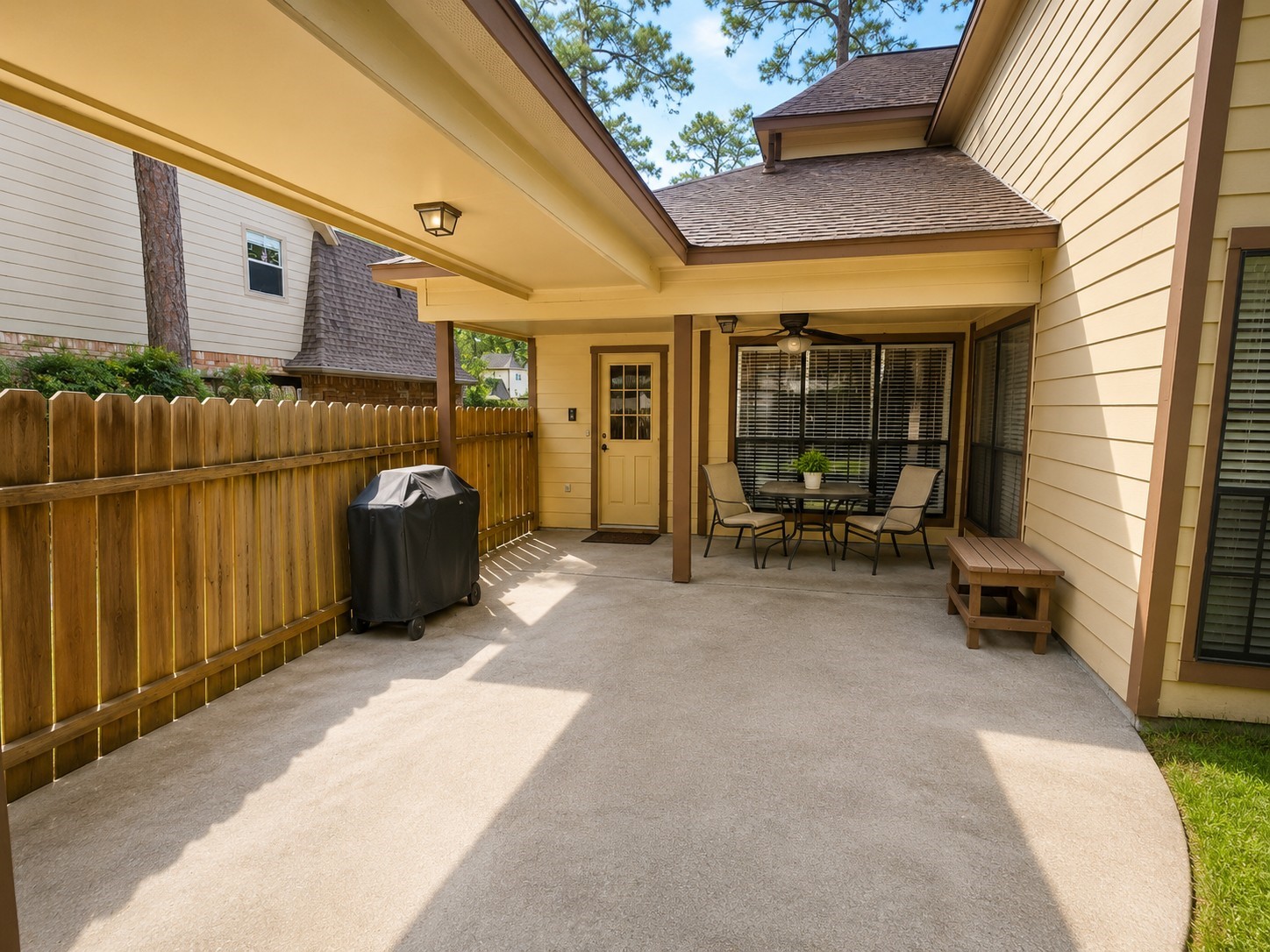 5518 Lacreek Lane Spring, TX 77379 - Photo 27 of 29 COVERED PATIO - Spacious covered patio offers plenty of room for outdoor seating, grilling and entertaining, with convenient access to the home and backyard.