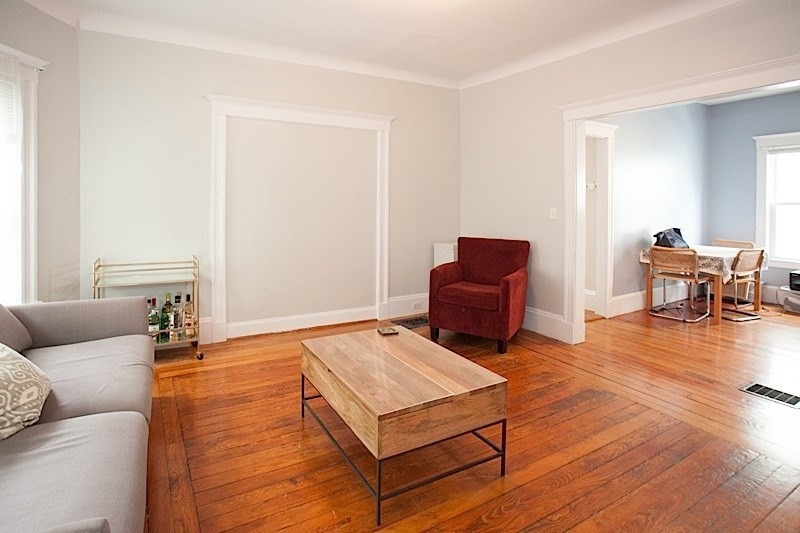 50 Holyoke Road, Unit 1 Somerville, MA 02144 - Photo 6 of 14 a living room with furniture and wooden floor