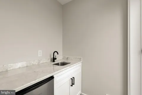 a close view of a sink and dishwasher