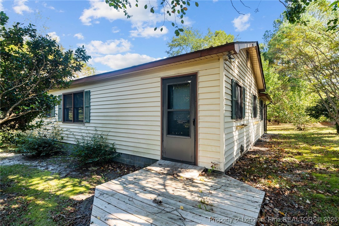 1430 Cypress Church Road Cameron, NC 28326 - Photo 2 of 42 a view of a house with backyard
