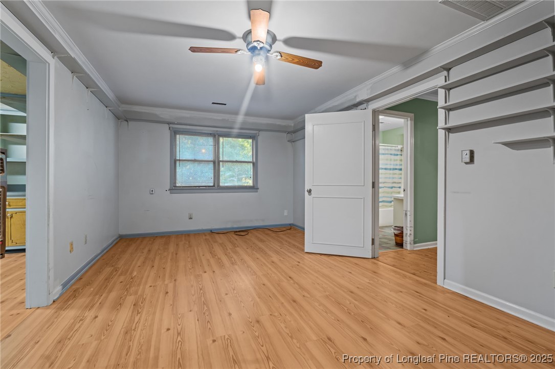 1430 Cypress Church Road Cameron, NC 28326 - Photo 30 of 42 wooden floor in an empty room with a window