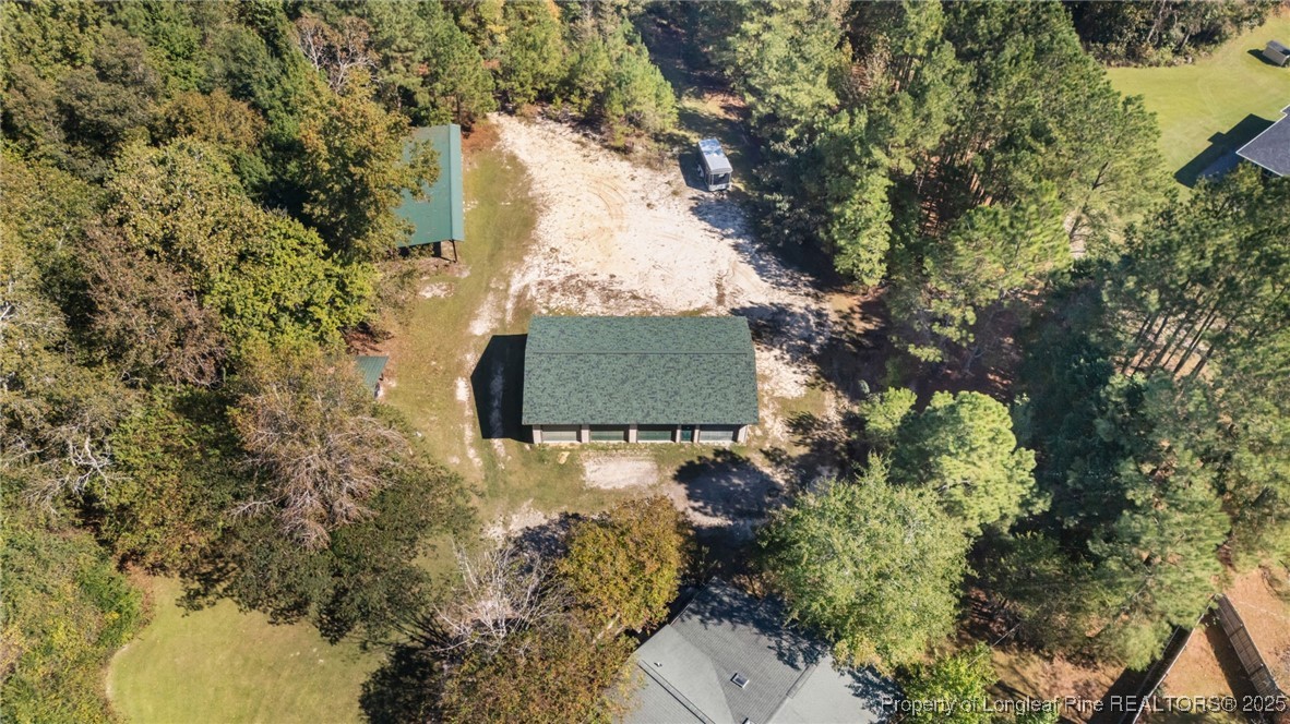 1430 Cypress Church Road Cameron, NC 28326 - Photo 3 of 42 a view of outdoor space and outdoor seating
