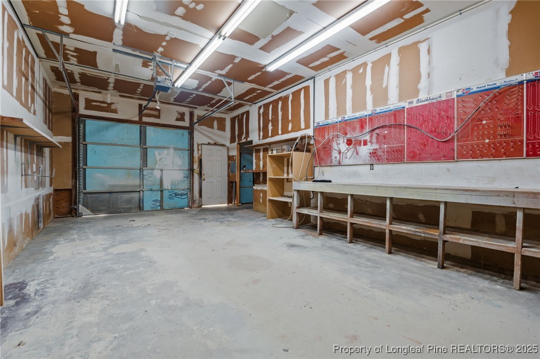 1430 Cypress Church Road Cameron, NC 28326 - Photo 32 of 42 a view of an empty room with storage