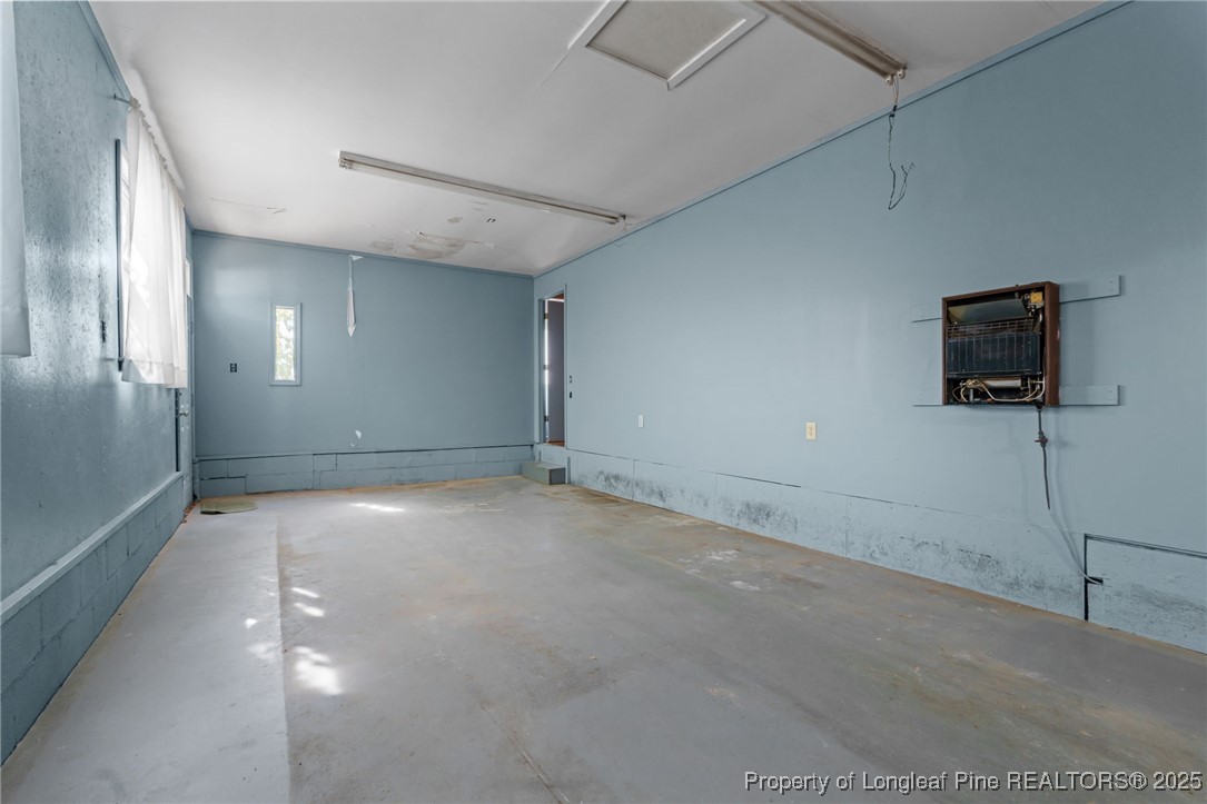 1430 Cypress Church Road Cameron, NC 28326 - Photo 39 of 42 a view of an empty room with a tv
