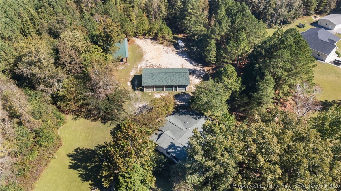 1430 Cypress Church Road Cameron, NC 28326 - Photo 40 of 42 an aerial view of residential house with outdoor space and trees all around