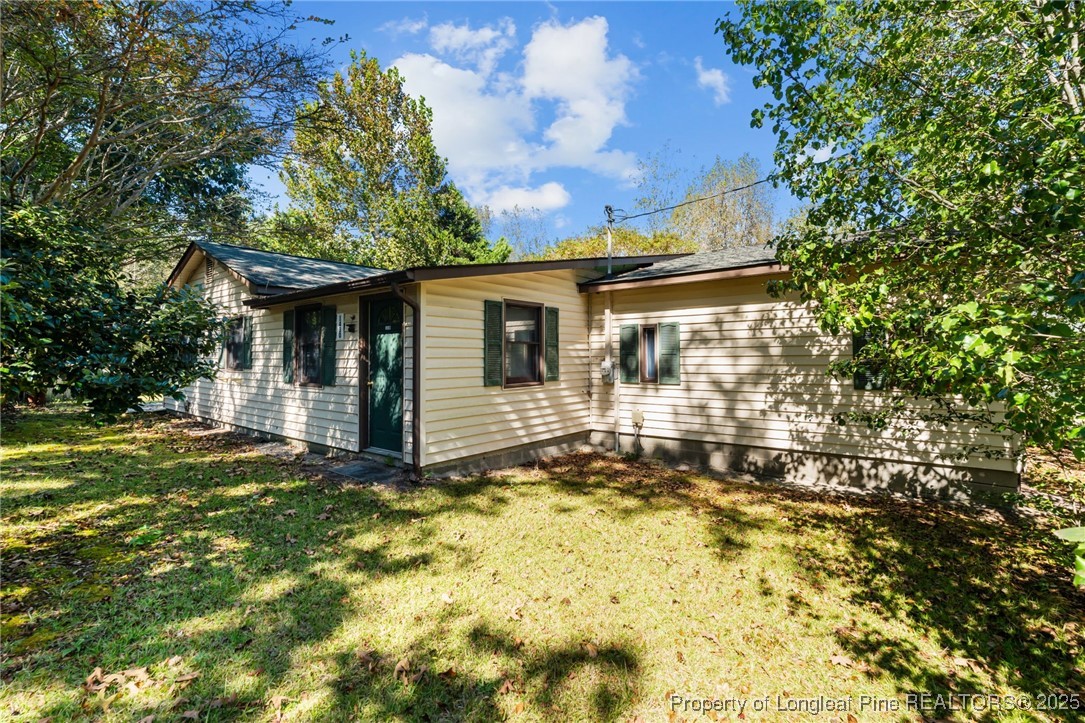 1430 Cypress Church Road Cameron, NC 28326 - Photo 10 of 42 a view of a house with a yard