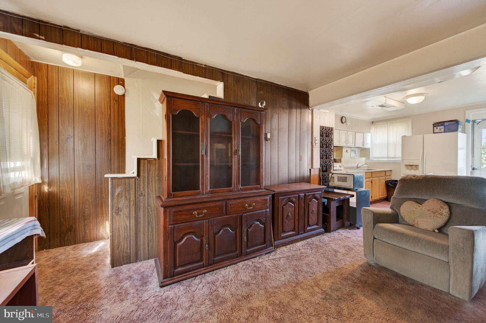 952 Armistead Way Baltimore, MD 21205 - Photo 5 of 13 a living room with furniture and a large window