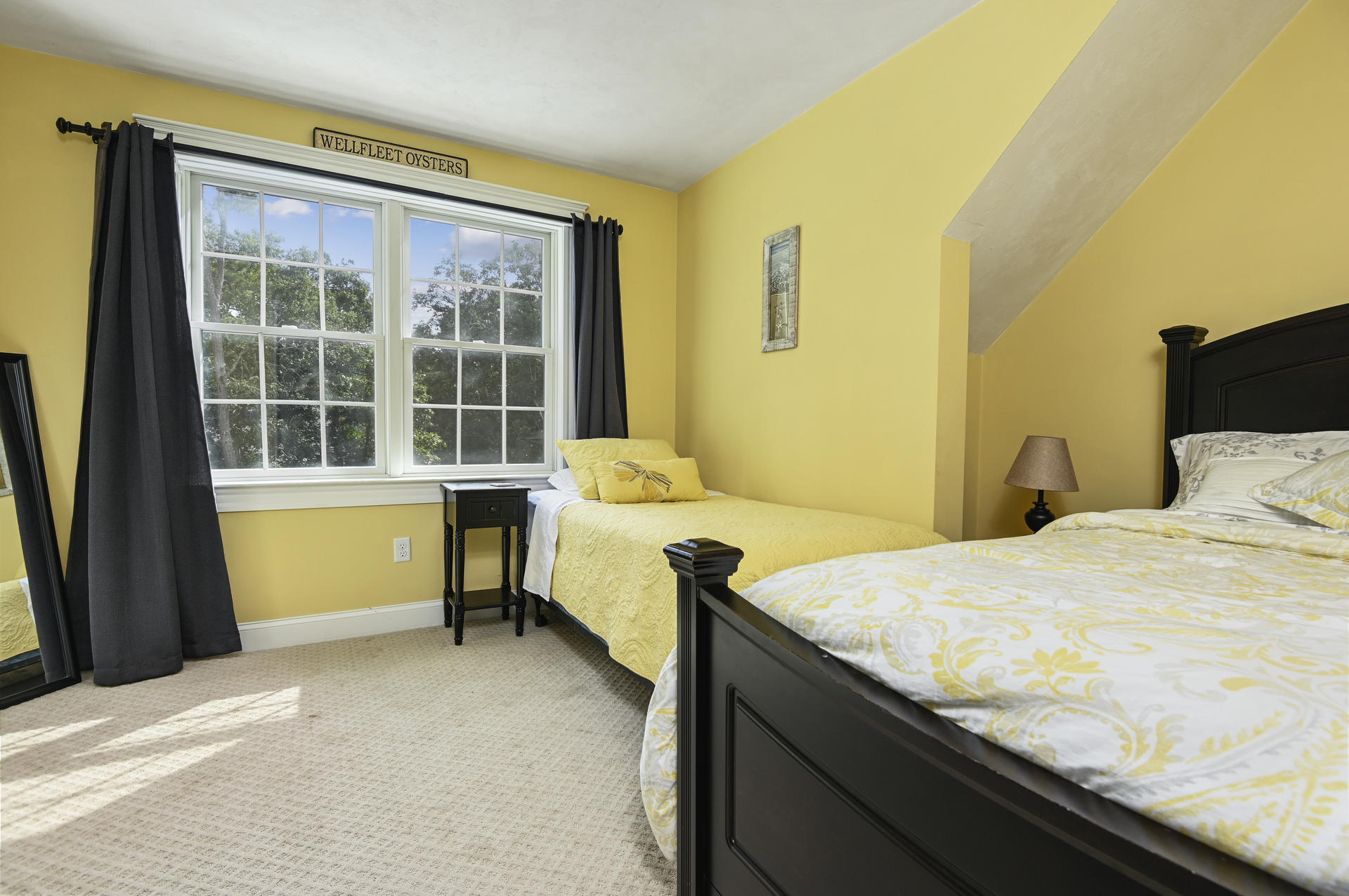 20 Hughes Road Eastham, MA 02642 - Photo 13 of 20 a bedroom with a bed and wooden floor