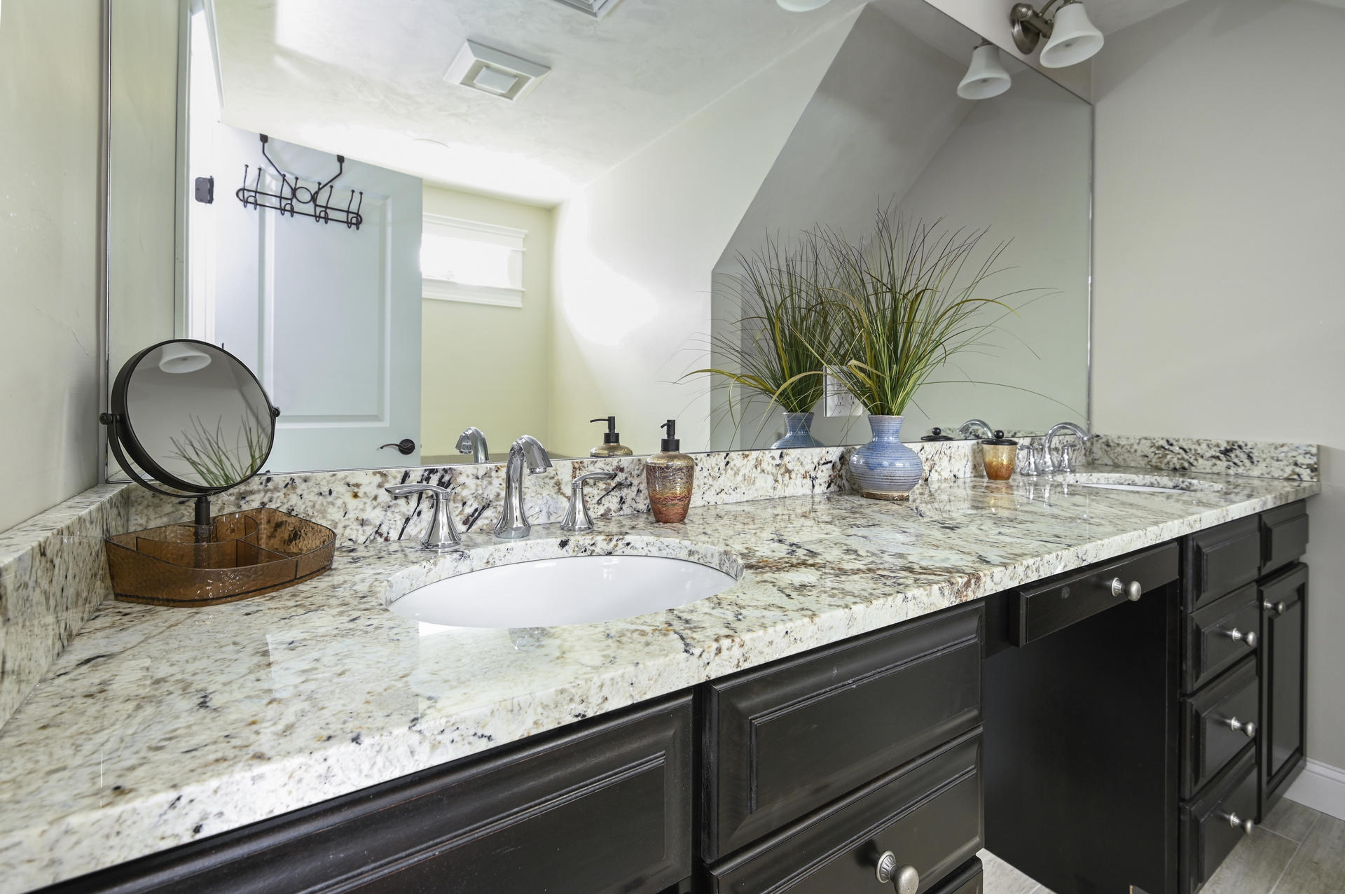 20 Hughes Road Eastham, MA 02642 - Photo 14 of 20 a bathroom with a granite countertop sink a mirror and vanity