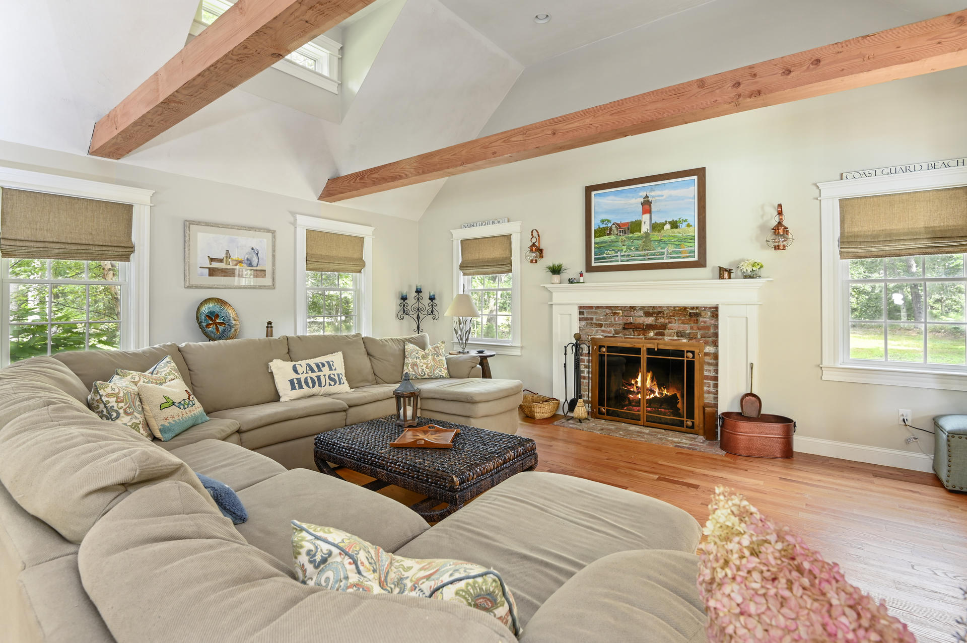 20 Hughes Road Eastham, MA 02642 - Photo 3 of 20 a living room with furniture large window and a fireplace