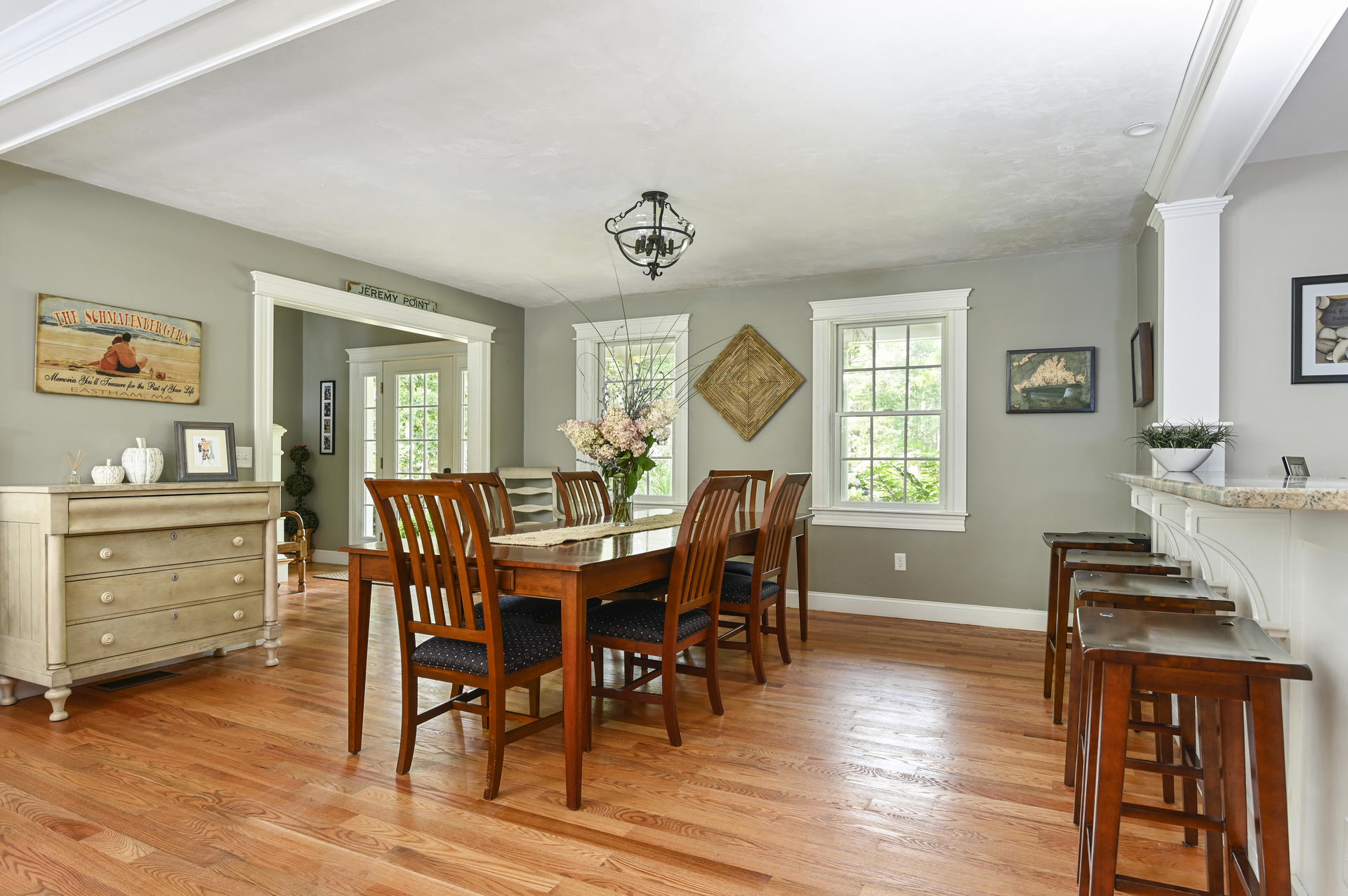 20 Hughes Road Eastham, MA 02642 - Photo 4 of 20 a view of a dining room with furniture window and wooden floor