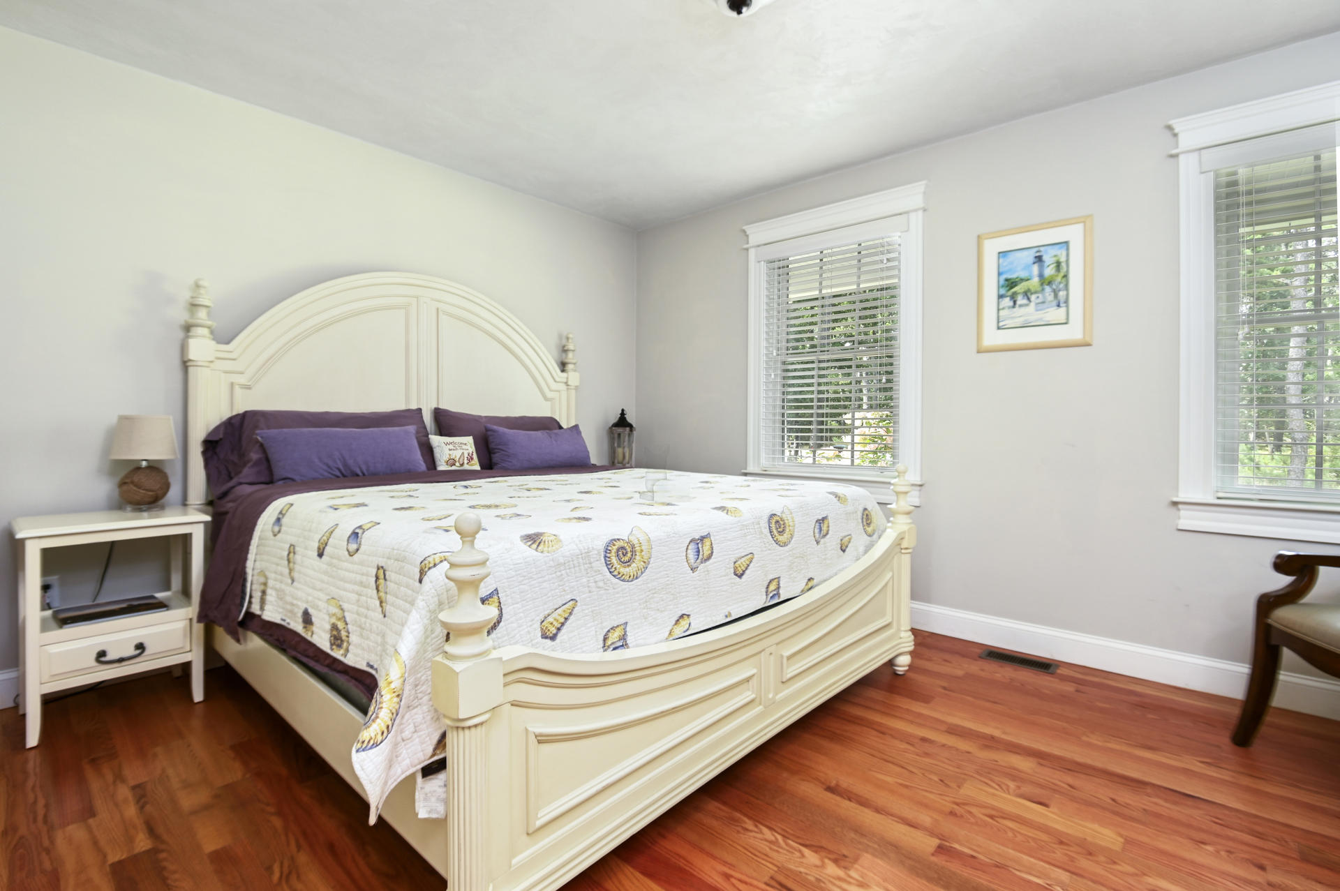 20 Hughes Road Eastham, MA 02642 - Photo 9 of 20 a bed sitting in a bedroom next to a window